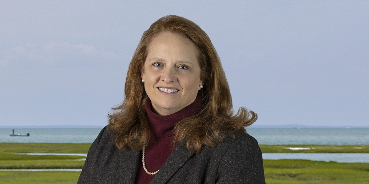 headshot of CJ Conrad, Executive Vice President and Chief Client Experience Officer