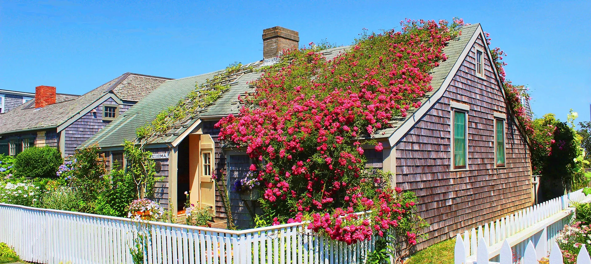 A cape cod house on the beach