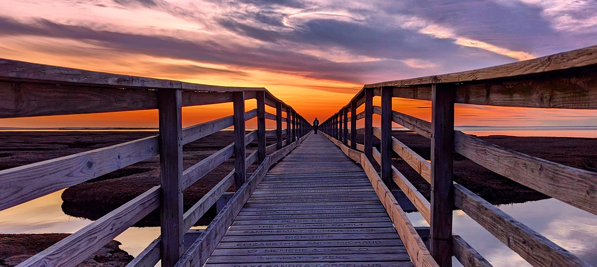 View of the boardwalk at sunset