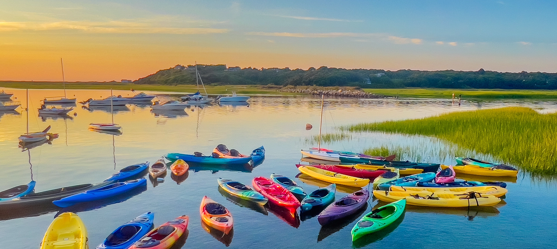 Colorful kayaks on the shore