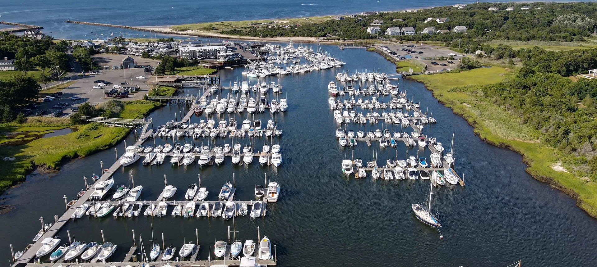Birds eye view of boats docked by the beach