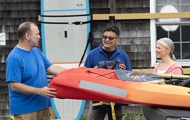 A couple renting kayaks
