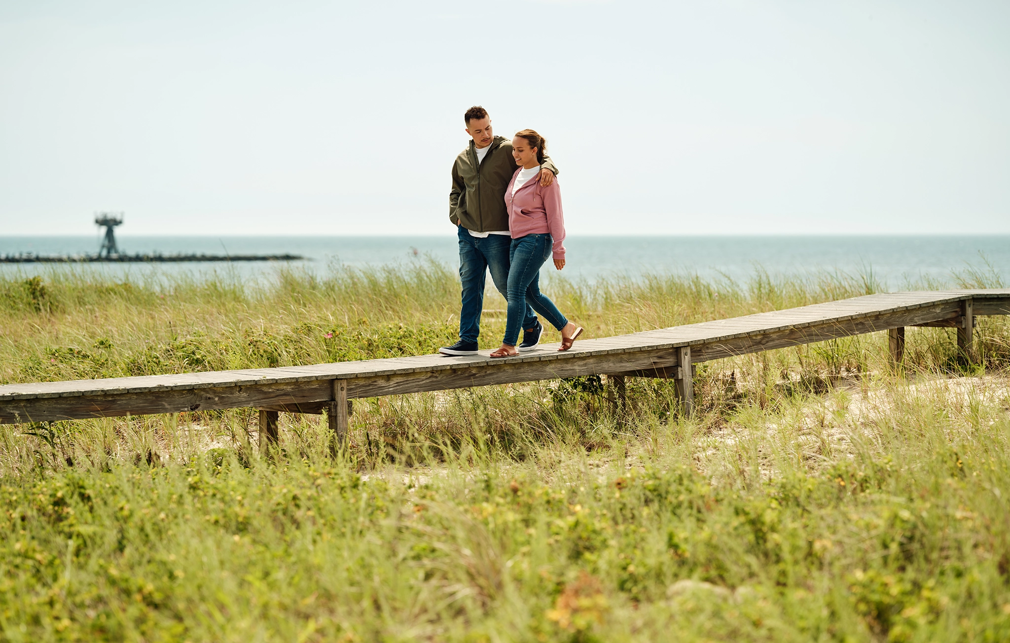Couple walking on the boardwalk