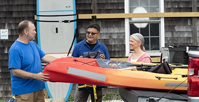 A couple renting a kayak