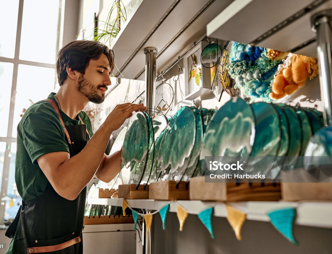 Hero placeholder image of a man gazing at plates.